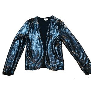 A lovely sequined blazer. Perfect for date night. Only worn twice.